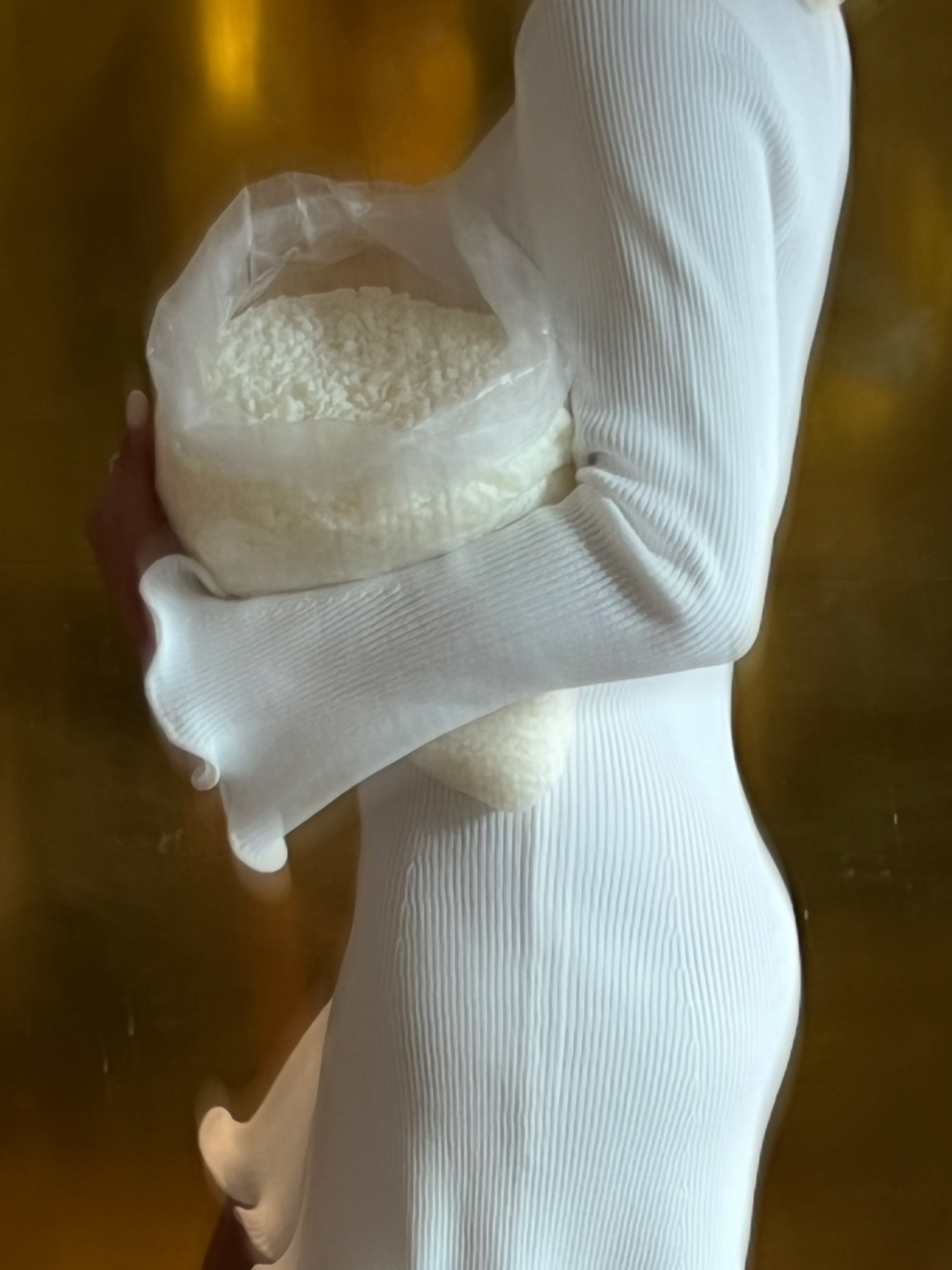 Hand-pouring candles in small batches